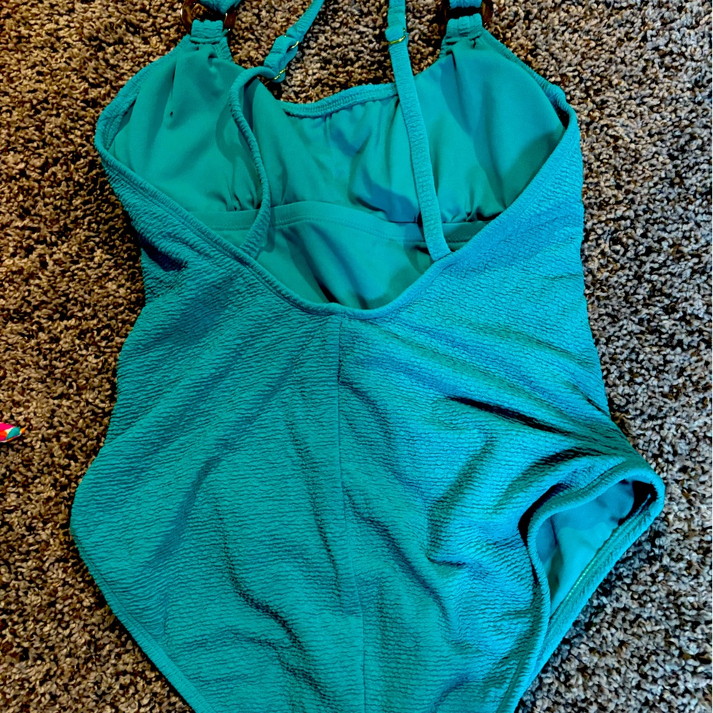 New one piece 
Adjustable straps
